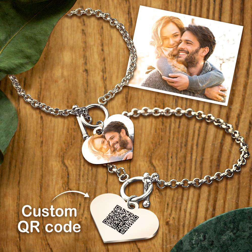 Personalized bracelet featuring a QR code and heart pendant for unique gifts.