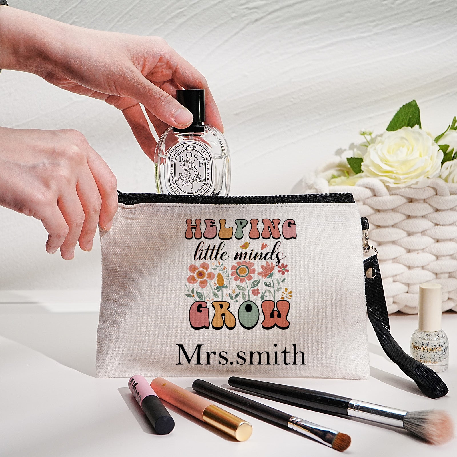 Custom canvas makeup bag with flower pencil design and name, ideal teacher gift.