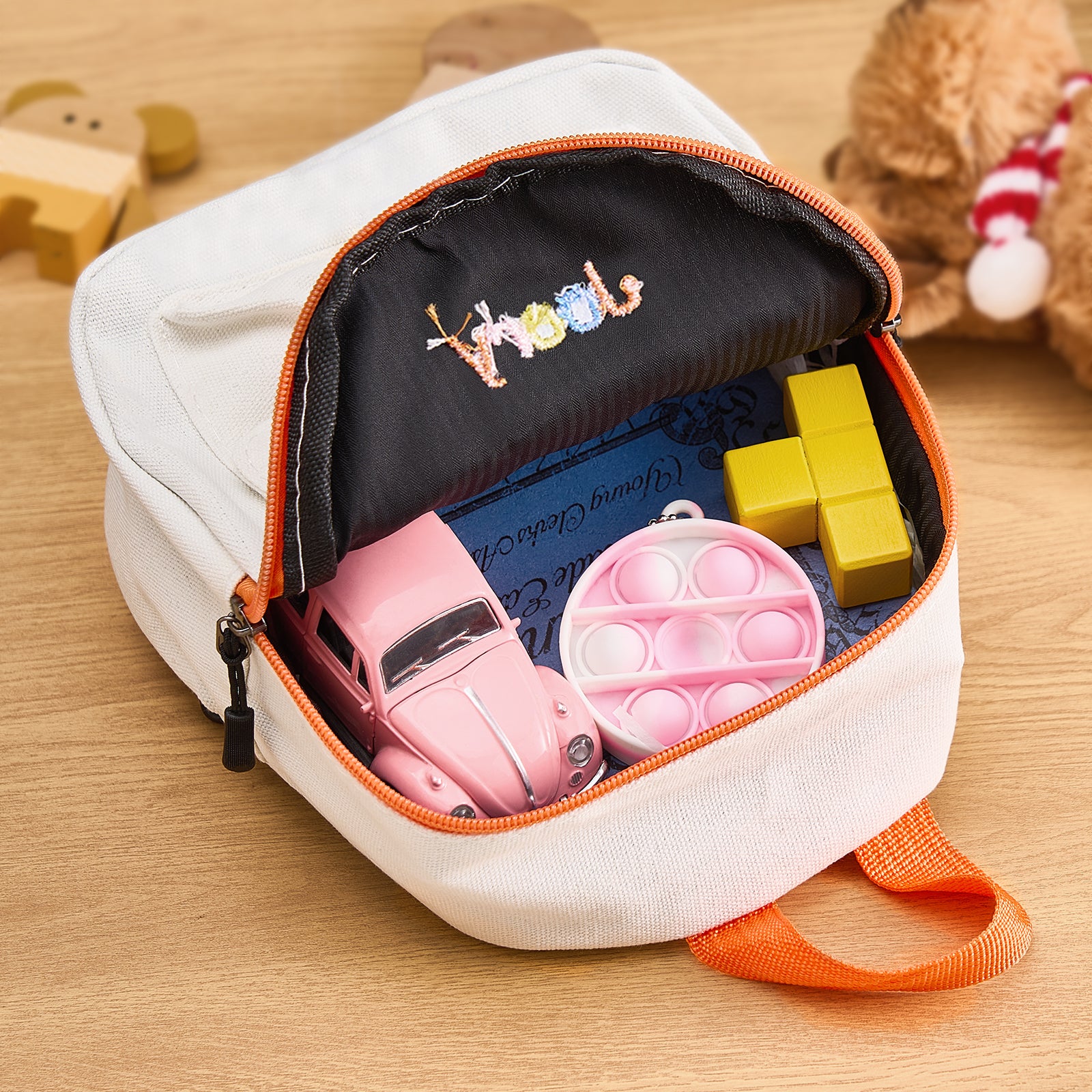 Personalized mini backpack with embroidered name, perfect school bag gift.