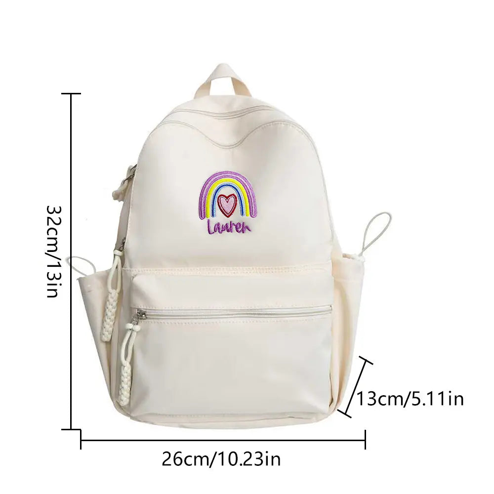 Personalized embroidered rainbow backpack with name, perfect school or back-to-school gift for kids.