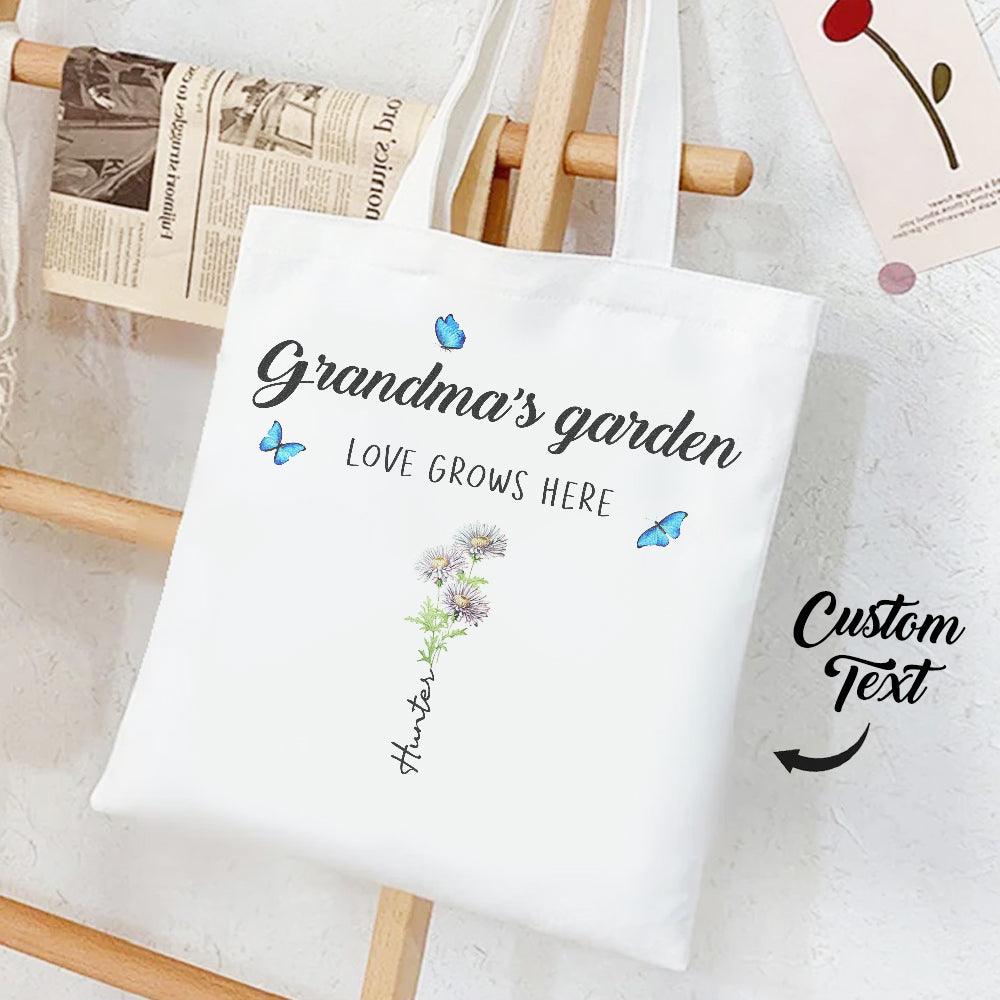 Personalized tote bag with birth flowers and kids' names, ideal gift for grandma or mom.