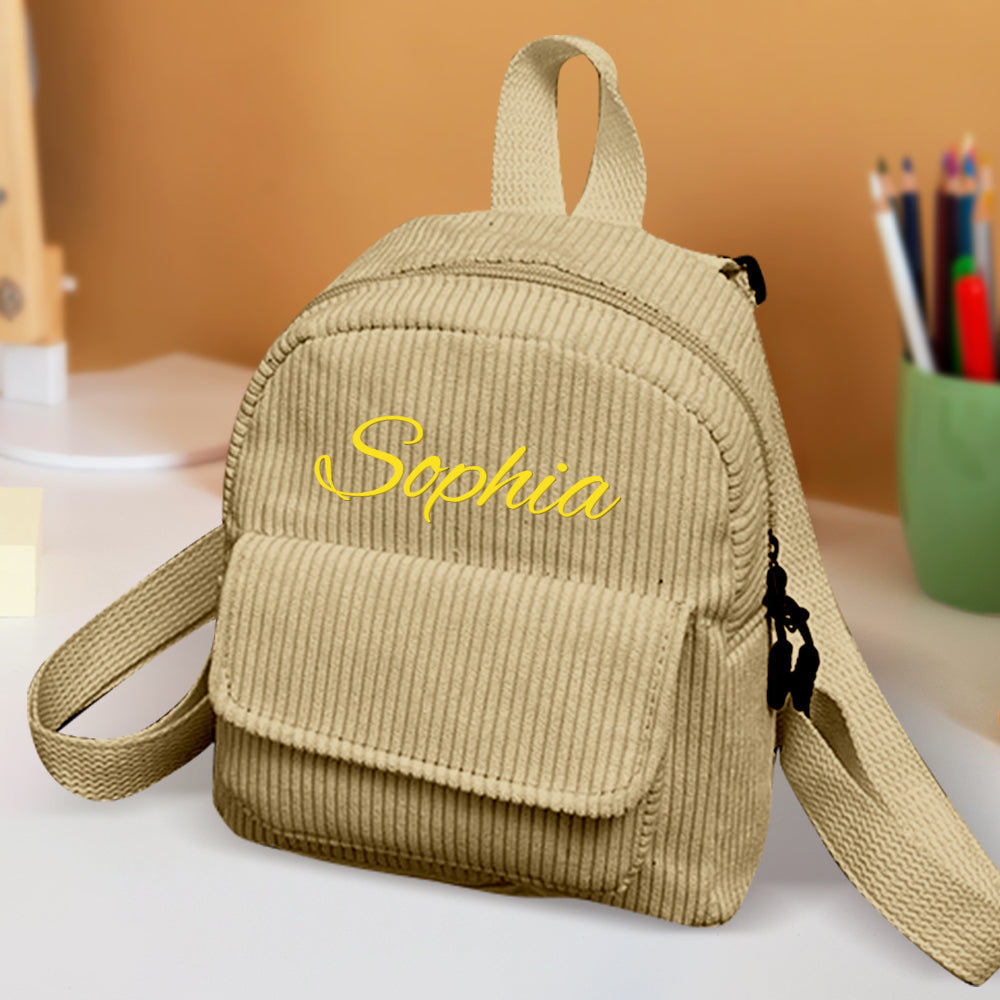 Personalized mini corduroy backpack with name, perfect for kids' school or back-to-school gift.