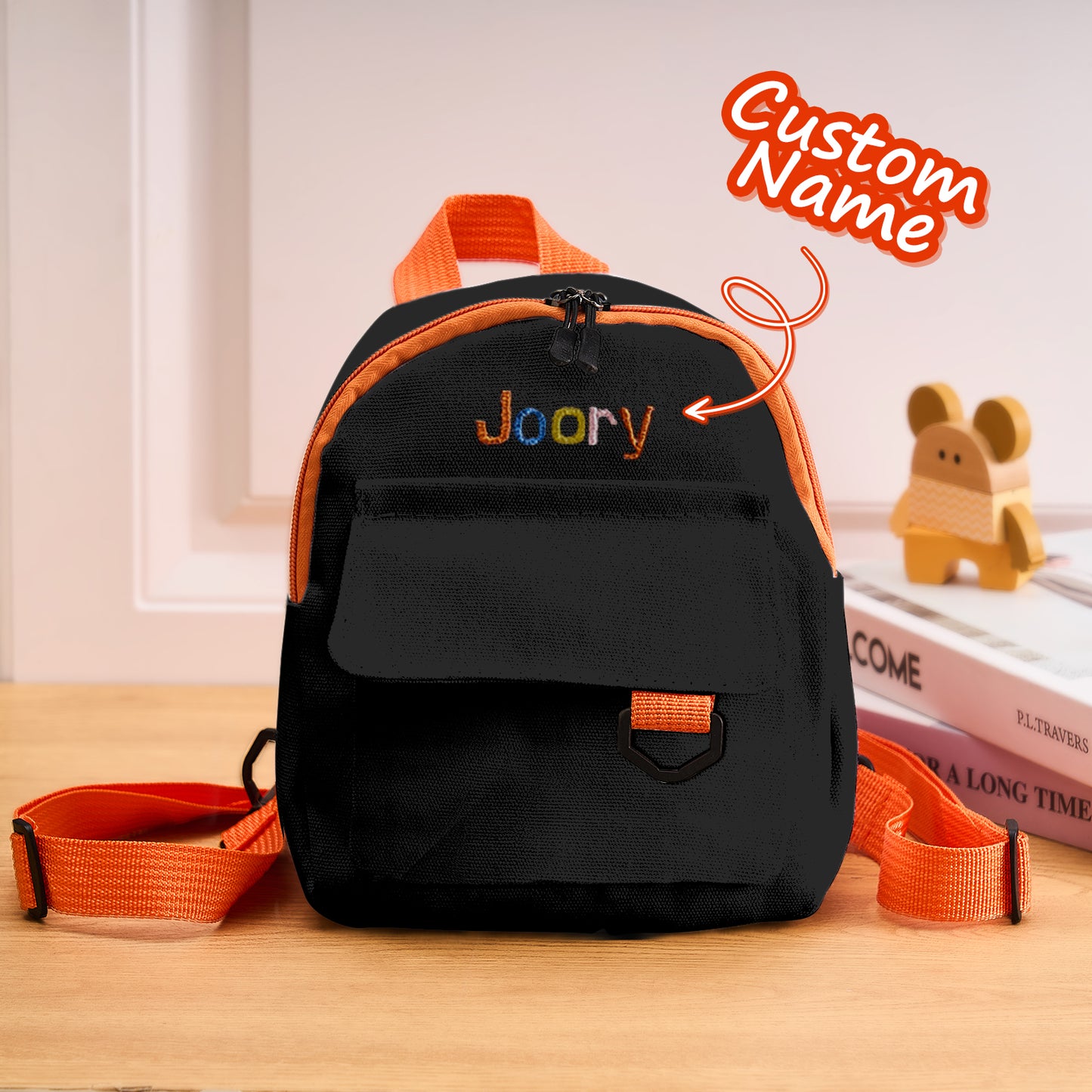 Personalized mini backpack with embroidered name, perfect school bag gift.