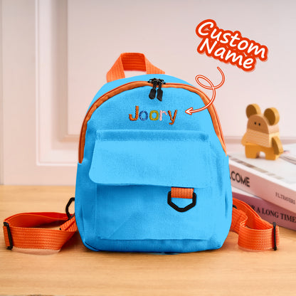 Personalized mini backpack with embroidered name, perfect school bag gift.