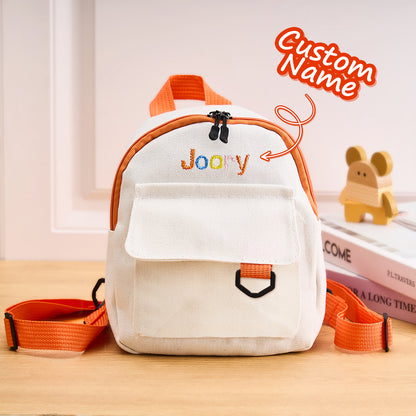 Personalized mini backpack with embroidered name, perfect school bag gift.