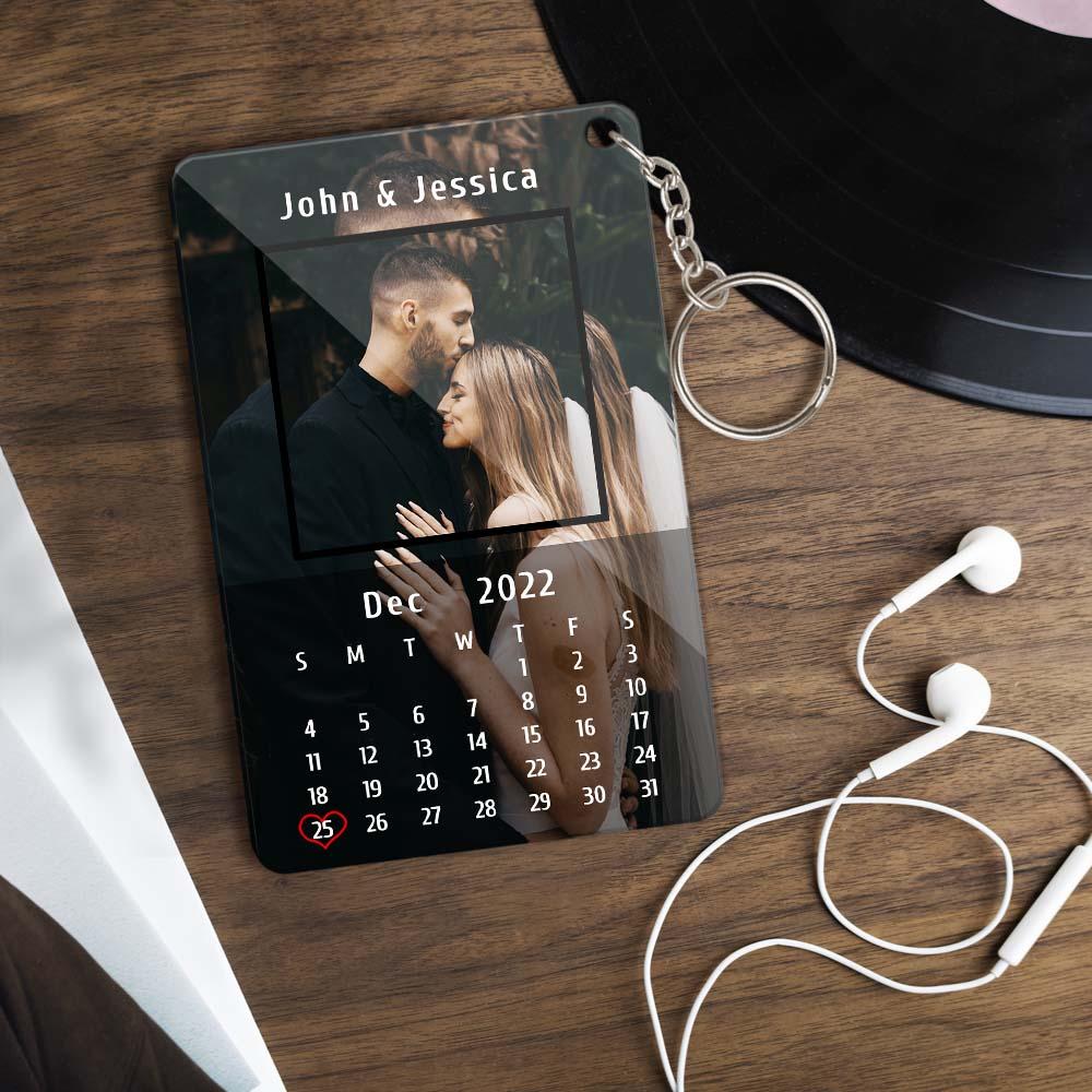 Custom acrylic calendar keychain with photo and text for couples.