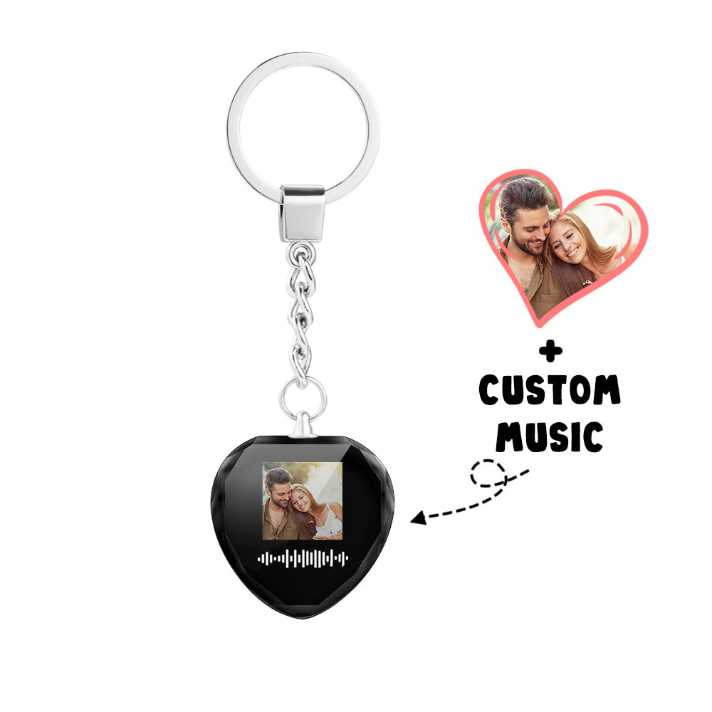 Personalized heart crystal photo keychain with scannable music code.