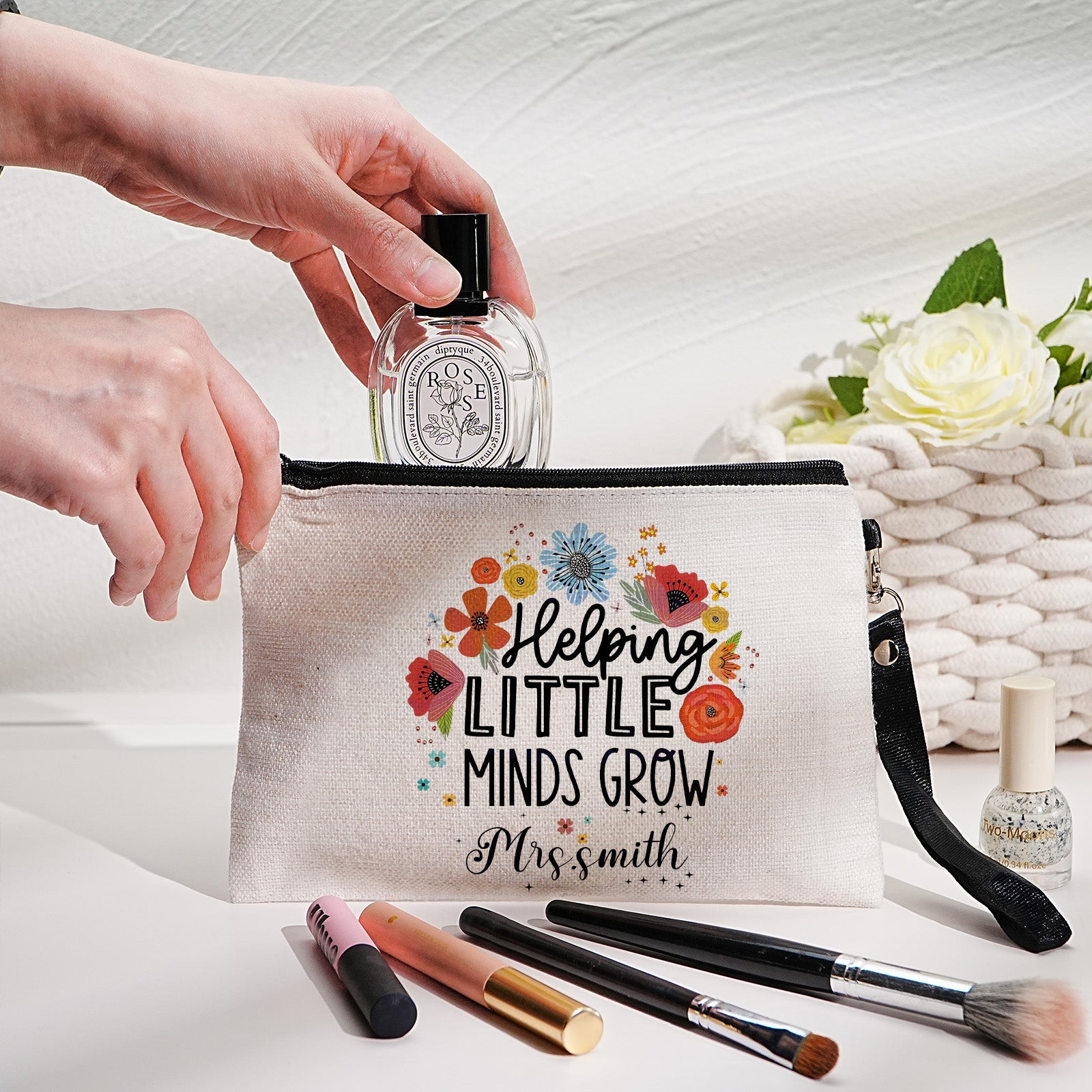 Custom canvas makeup bag with flower pencil design and name, ideal teacher gift.